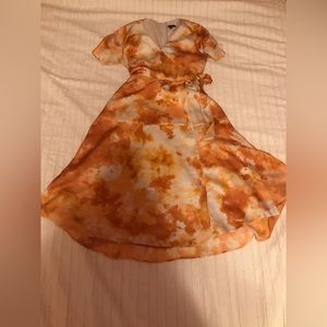 Orange and white wrap dress